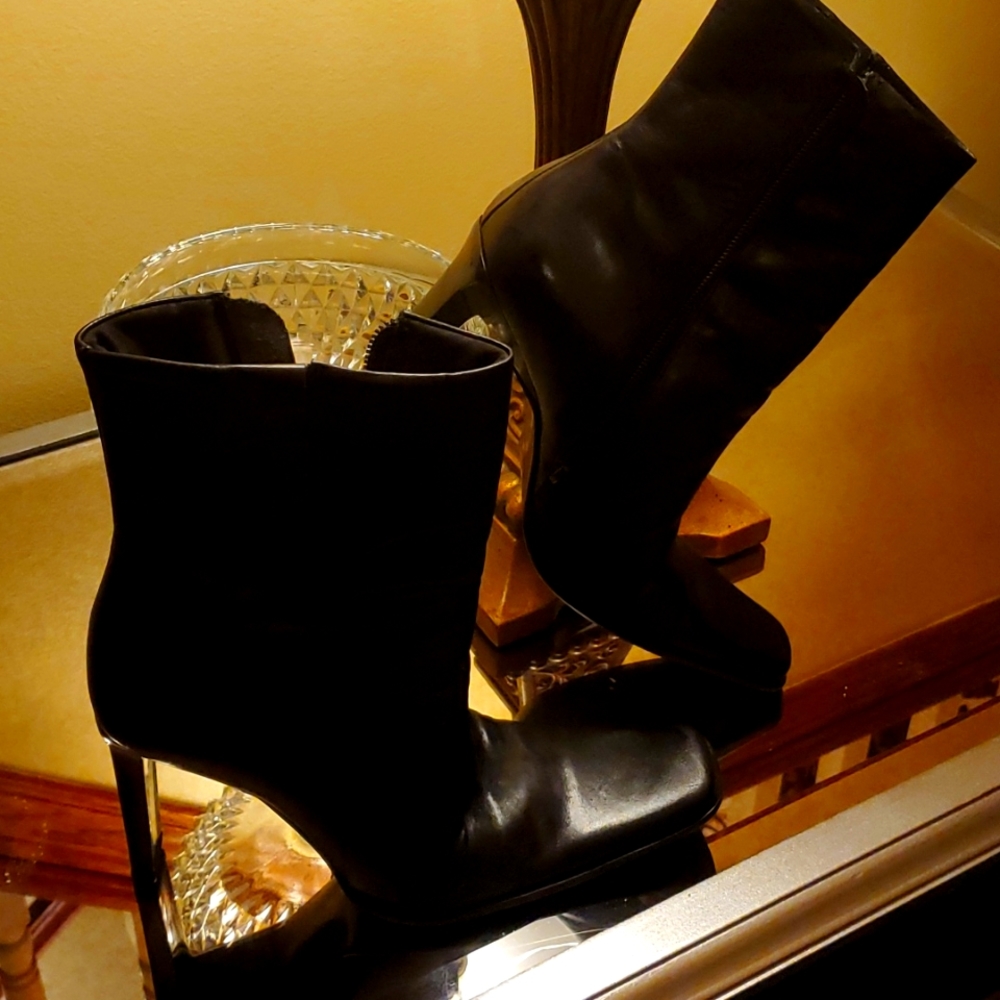 Black high heel leather booties